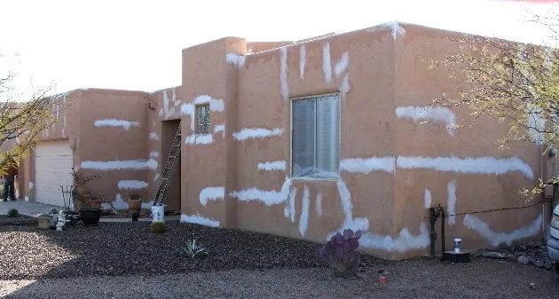 Stucco repair in progress