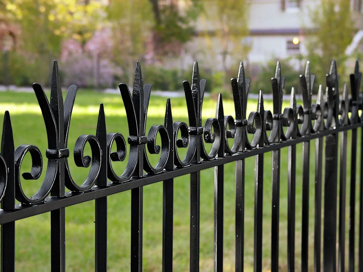 Wrought iron fence painting