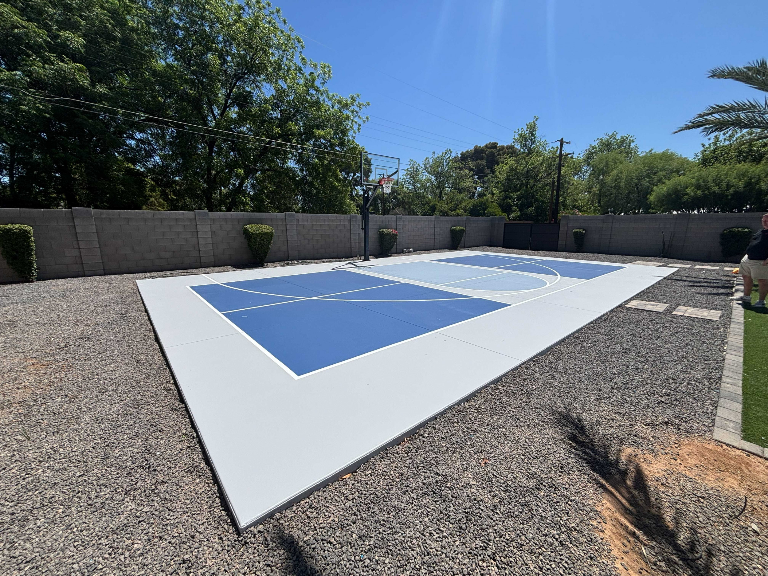 Gray and blue multi-sport backyard game court